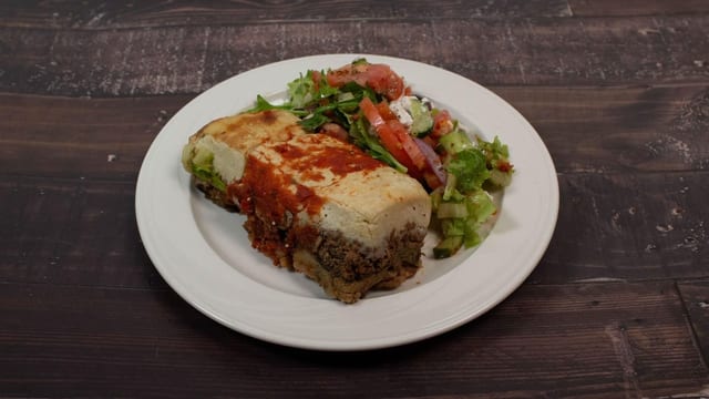 Moussaka Served with Greek Salad.